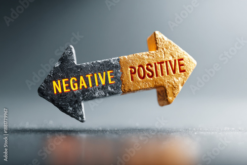 3D illustration of two stone arrows, one orange and one black, pointing in opposite directions. Labels 
