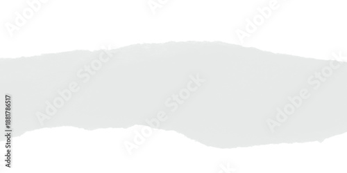 Textured torn white paper strip with rough jagged edges isolated on black background grunge overlay design element copy