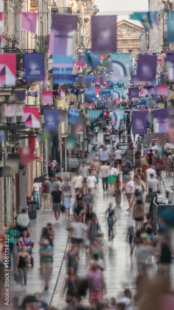 custom made wallpaper toronto digitalTourists and locals walking and shopping in Rue Sainte-Catherine timelapse, Bordeaux, France. The longest pedestrian street in the country. Atmosphere of urban life. Colorful flags decorate the street