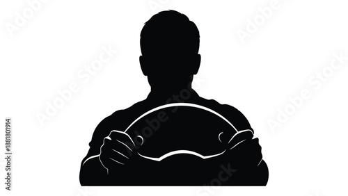 silhouette of a person holding a plate of food likely enjoying a meal or snack