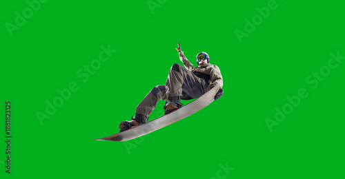 Canvas Print Snowboarding rider isolated on green screen.