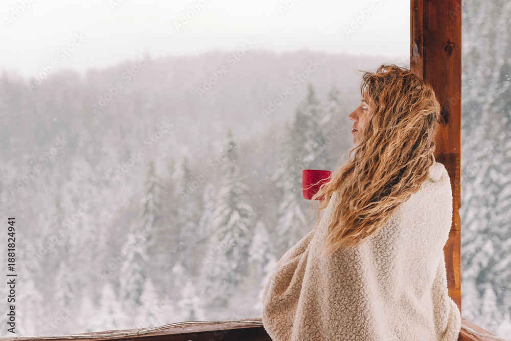 Fototapeta premium Blonde Woman in Cozy Plaid with Hot Drink