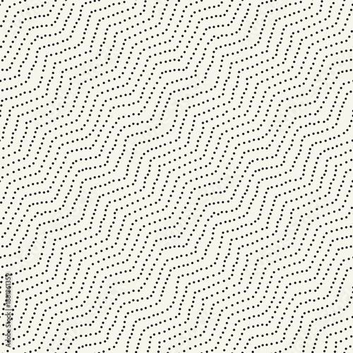 Vector seamless pattern. Modern spotted texture. Repeating abstract dotted background. Graphic diagonal wavy stripes. Can be used as a swatch in Illustrator.