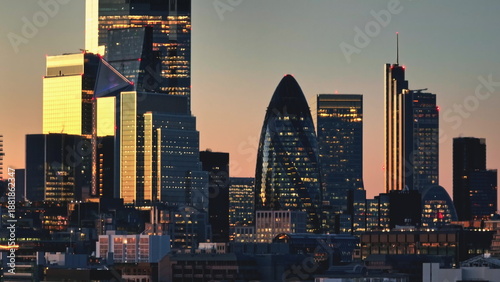 Aerial panorama of London skyscrapers buildings, blending historical and contemporary architecture. Modern business center, cityscape skyline night background. Travel destination. Drone flight