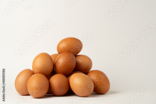 Stacked eggs on a white background