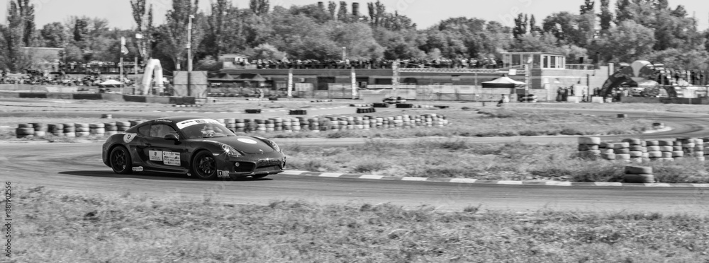 Obraz premium racing car. motorsport. circuit racing. dangerous moments on the track. high vehicle speed. sharp turn. demolition of wheels.