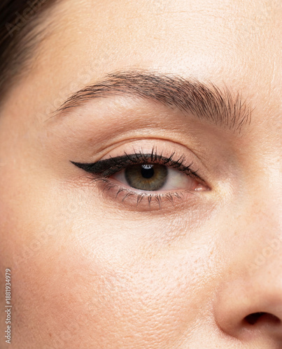 Woman with eyeliner makeup and captivating and serene beauty
