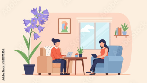 Two women work on laptops in a room with a large plant