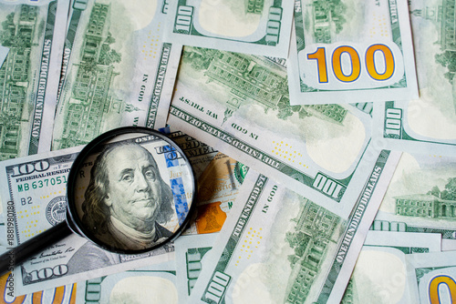 American bills in denominations of 100 US dollars are laid out on the surface and occupy the entire area of ​​the image, the background is made of American dollars, greenbacks of large denominations, 