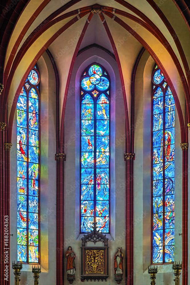 Fototapeta premium Mainz, Germany. Stained glass windows in the choir of Collegiate Church of St. Stephan. The church was built in 1267-1340.