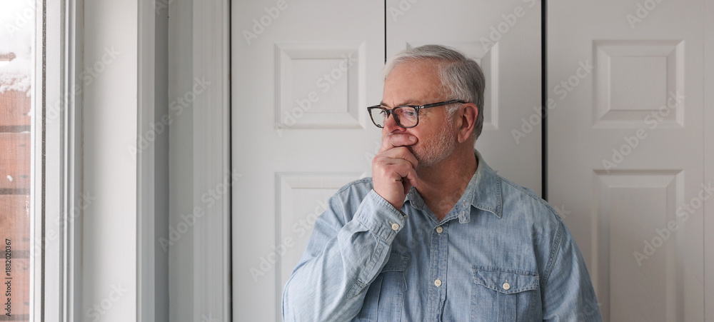 Fototapeta premium Portrait of senior pensive man worrying or with memory loss.
