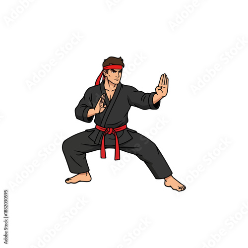 Martial Artist in Black Gi and Red Headband Performing a Stance.
