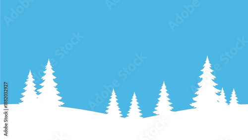 Serene winter landscape with snow-covered trees against a clear blue sky from a low viewpoint on a frosty day