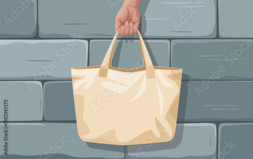 Hand holding a tote bag against a grey brick wall illustration