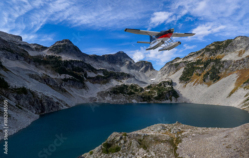 Wallpaper Mural Seaplane Flying Over Mountain Lake Canyon in Dramatic Alpine Landscape With Snowy Peaks Torontodigital.ca