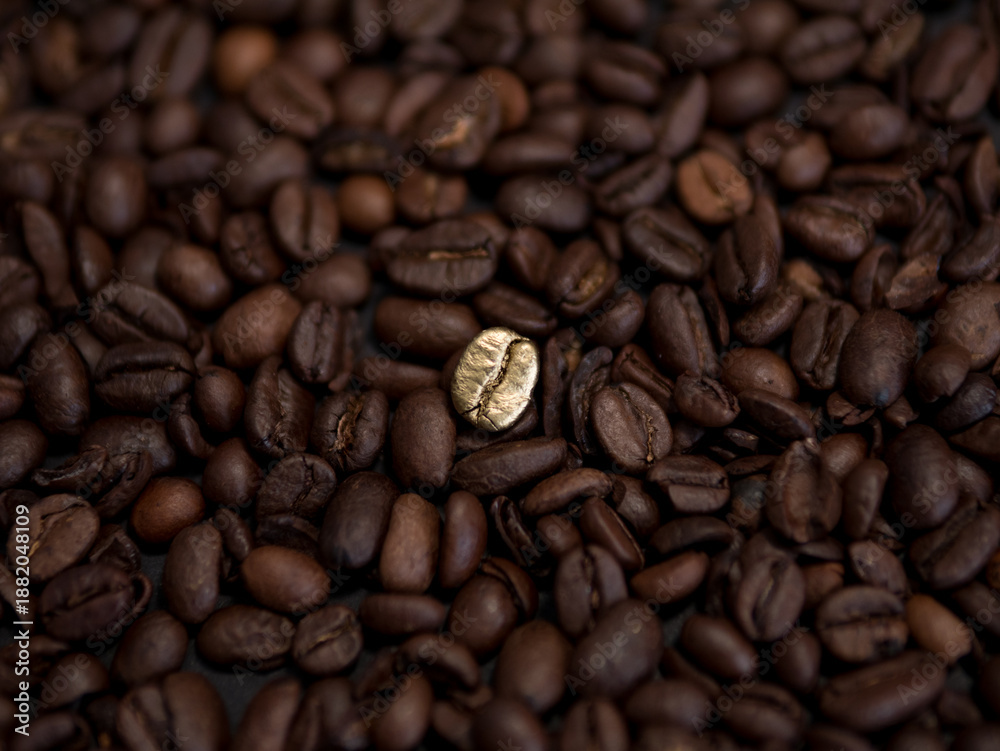 Fototapeta premium Golden Coffee Bean as Symbol of Luxury and Rising Value