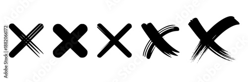 Collection of six black cross marks in different hand-drawn brush stroke styles, representing incorrect answers or deletion, on a white background.