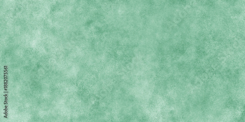 Abstract Elegant dark green background with mottled vintage texture in old fancy background design, texture of colored parchment paper.
