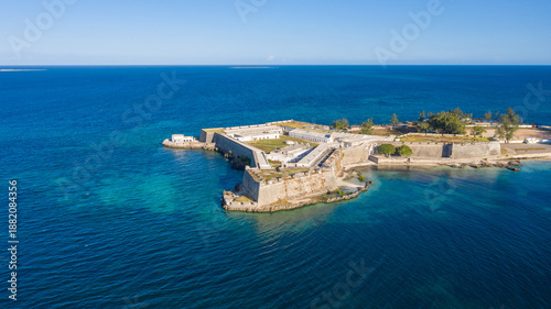 Aerial view of the Fortaleza de Sao Sebastiao, a stone fortress standing resolute against the azure sea, a testament to history, Nampula, Nampula Province, Mozambique.