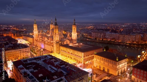Wallpaper Mural Aerial View Capturing Sunset Glow Illuminating Cathedral Domes And Tranquil River Reflections. Zaragoza. Spain  Torontodigital.ca