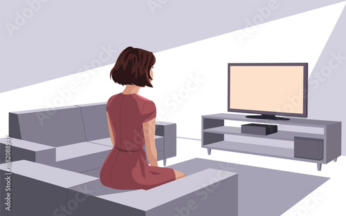 Woman sitting alone on couch watching television in a modern living room interior