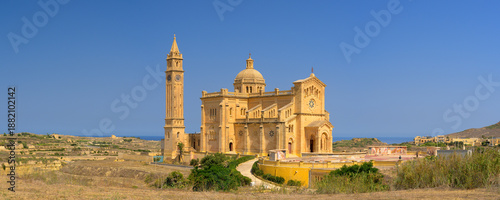 Panoramic view of Ta' Pinu Church on the island of Gozo in Malta with a beautiful blue sky.