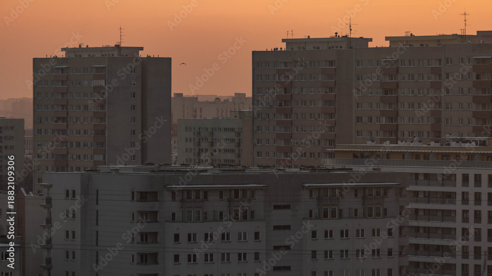 Fototapeta premium Urban Apartment Silhouettes at Winter Sunset