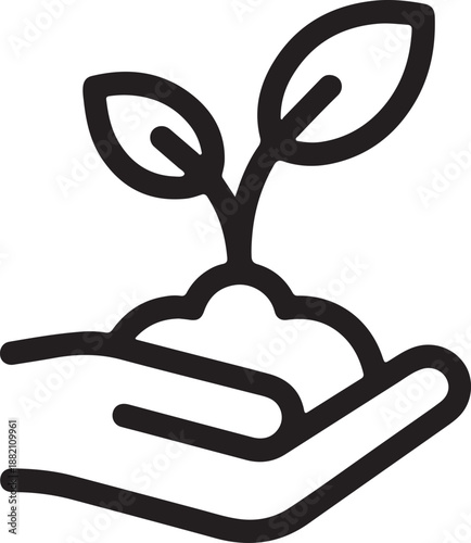 Hand holding a seedling with two leaves sprout soil