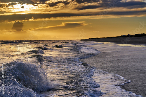 waves crashing along beach