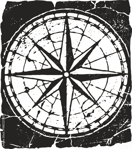 Black and white cracked vintage compass rose design with eight directional points on textured background