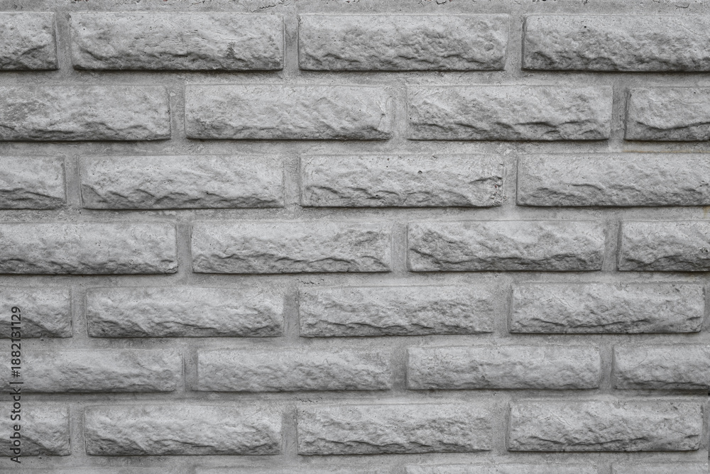 Fototapeta premium brick fence, stone fence texture