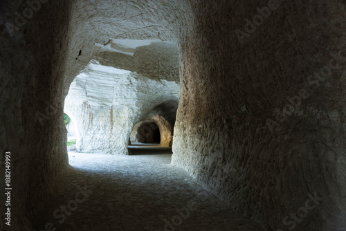 Interior of an ancient rock cave with carved tunnels chalk mines Mexico