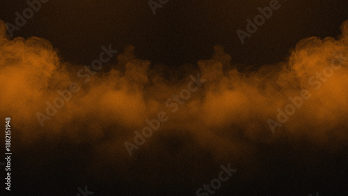 Фотография Symmetrical orange clouds of mist rising against a black background