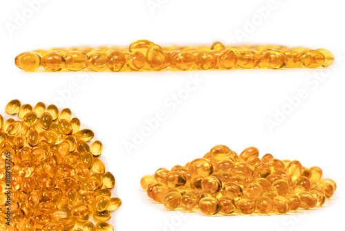 Tableau sur toile A group of yellow capsules isolated on a white background.
