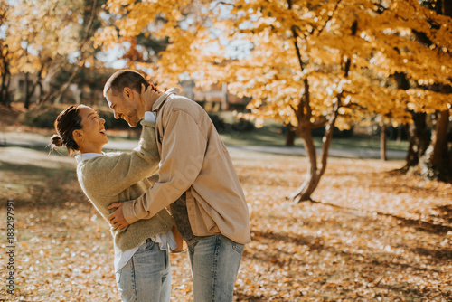 Joyful couple enjoying a be...