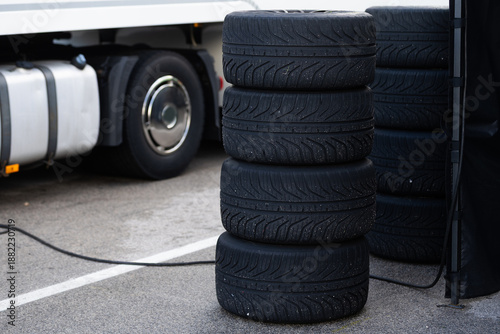 Quadro em tela Detail of a stack of tires with tires for racing cars, they are in the back of t