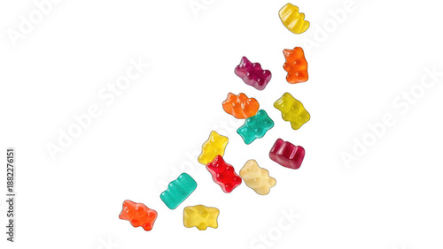 Colorful, translucent gummy bear candies scattered against a stark black background