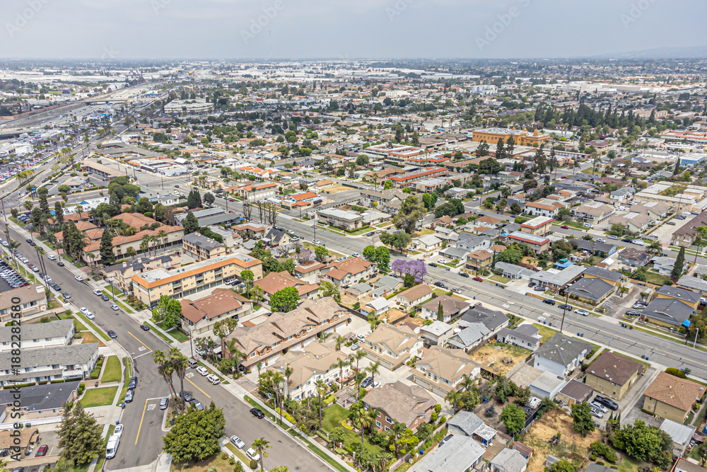 Fototapeta premium Buena Park, California – May 30, 2024: Aerial Drone City View Photo toward Beach Blvd, Freeway 5 Five, Commonwealth Ave, City of Buena Park, The Source OC with Commercial Buildings, Home, Town, Street