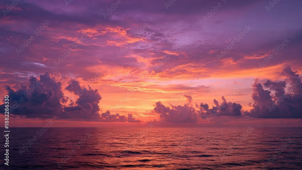 Naklejka premium Vibrant sunset over the ocean