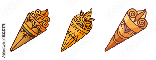Three ornate henna cones with intricate golden floral designs