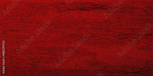 Aged red grunge wall texture with a dark vintage pattern on a rough weathered surface creates a dirty textured backdrop for industrial design