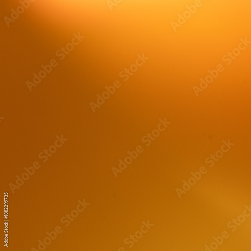Smooth orange and yellow gradient background with soft natural light blur