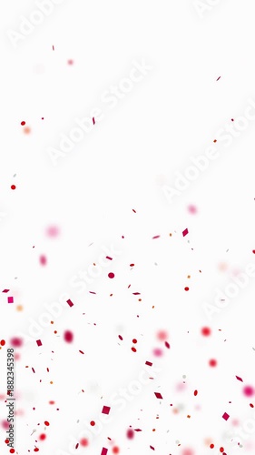 Confetti explosion. Animation of red confetti on a white background with depth of field in vertical format.