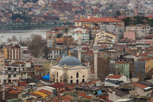Photography Panoramic view of part of Istanbul, Türkiye, with many buildings and a mosque in