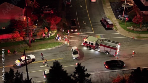 Aerial view Bright Emergency Lights Illuminate Road Accident Scene In Beechville Near Halifax Nova Scotia Canada During Nighttime Rescue Operation. Night Emergency Scene With