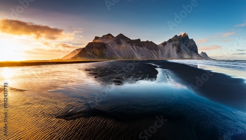 Golden Sunrise On Vestrahorn Mountain By Atlantic Ocean And Black Sand Beach In The Morning At Stokksnes Peninsula Iceland