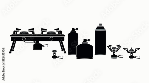 Collection of portable camping stoves and gas canisters for outdoor cooking.