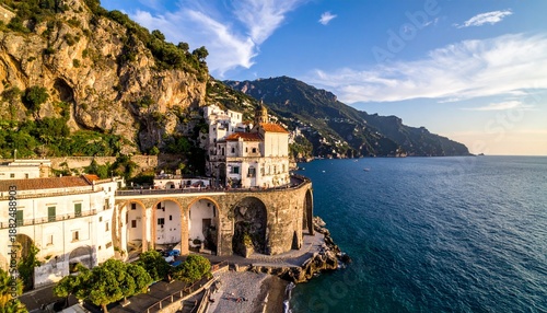 Stunning Coastal Architecture - A Picturesque View of Buildings and Cliffs Overlooking the Sea.
