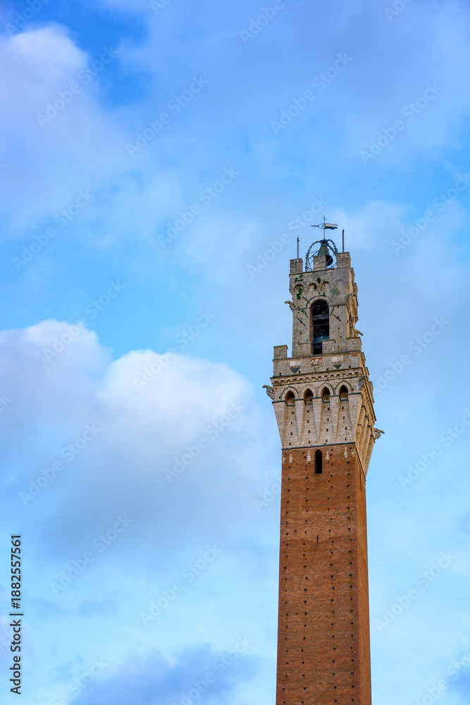 Fototapeta premium Torre del Mangia historic bell tower on a sunny day in Italy