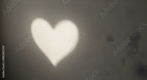 Abstract heart shape illuminated on a textured surface artistic background